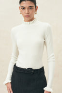 Moonlight white fitted wool blend turtleneck top with ruffle collar and cuffs