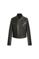 Black fitted vegan leather biker jacket with Western yoke seams, flap chest pockets and asymmetrical zip