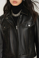 Womens black vegan leather biker jacket with Western yoke seams and flap pockets