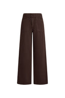 Cocoa brown wide leg jeans with a self fabric belt and shield shaped patch pockets