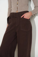 Cocoa brown wide leg women's jeans with a self fabric belt and shield shaped patch pockets