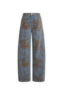 Blue floral flocked jacquard barrel leg jeans with curved side panels
