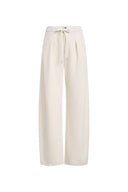 Pantalones Norma blancos de pernera curva con cordón