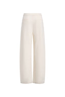 Pantalones Norma blancos de pernera curva con cordón