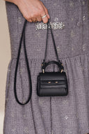 Rialto mini charm tas in top-grain nappa koeienleer