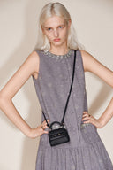 Rialto mini charm tas in top-grain nappa koeienleer