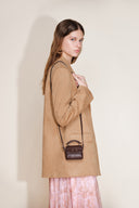 Rialto mini charm tas in top-grain nappa koeienleer
