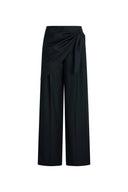 Black pinstripe wide leg pants with a tied scarf waist