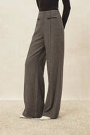 High waisted plaid wool blend wide leg pants with a contrast welt pocket and sharp front seam