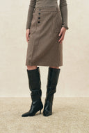 Houndstooth wool blend pencil skirt with asymmetric button placket and slit hem