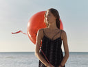 <h4><em>SUMMER CLEARANCE</em></h4><p>Up to 50% Off Summer Favorites, </p><p>bags included.</p>