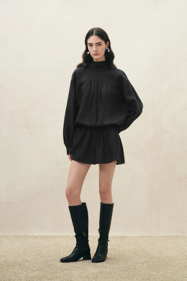 Black linen-blend shirt dress with standing collar, long sleeves, and gathered waist, front view on model