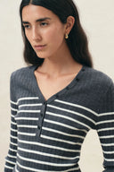 Gray striped ribbed knit Henley top with long sleeves and button neckline