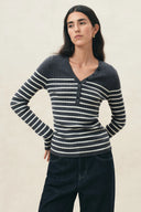 Gray striped henley knit top with long sleeves and ribbed texture